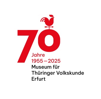 Schriftzug mit Wetterhahn und 70 Jahre