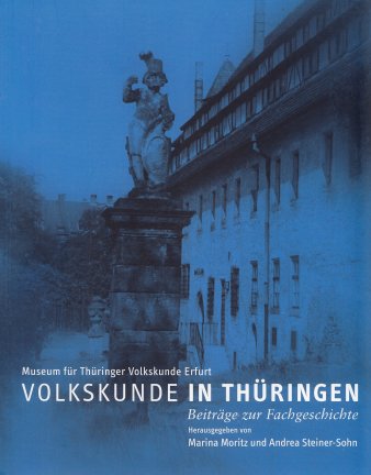Titel und Foto eines alten Gebäudes und einer Figur auf einer Säule